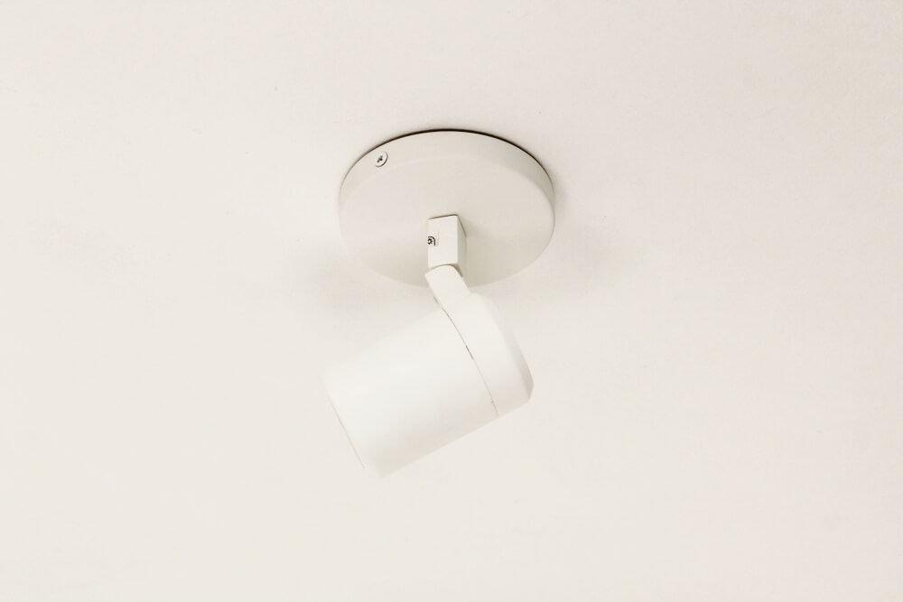 Kantelbare 1-lichts opbouwspot rond DOCCIA IP44 | Wit