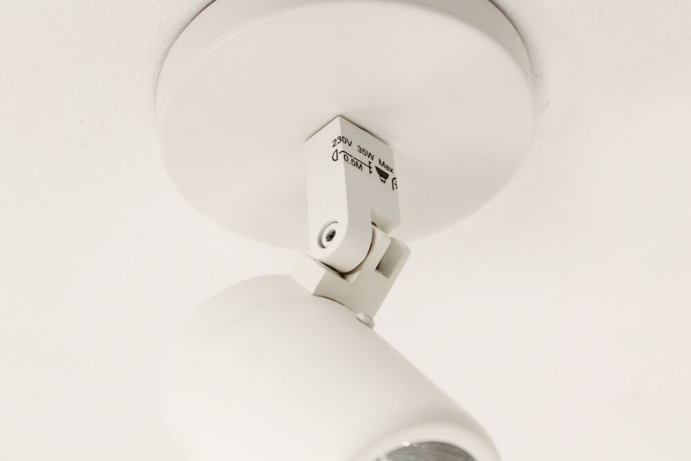 Kantelbare 1-lichts opbouwspot rond DOCCIA IP44 | Wit