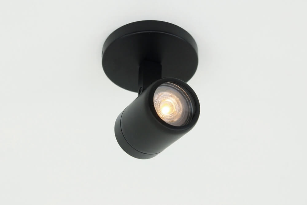 Kantelbare 1-lichts opbouwspot rond DOCCIA IP44 | Zwart