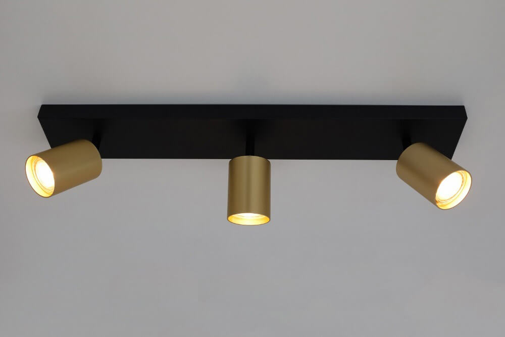 Strakke kantelbare 3-lichts opbouwspot CILINDRA | Zwart / Goud