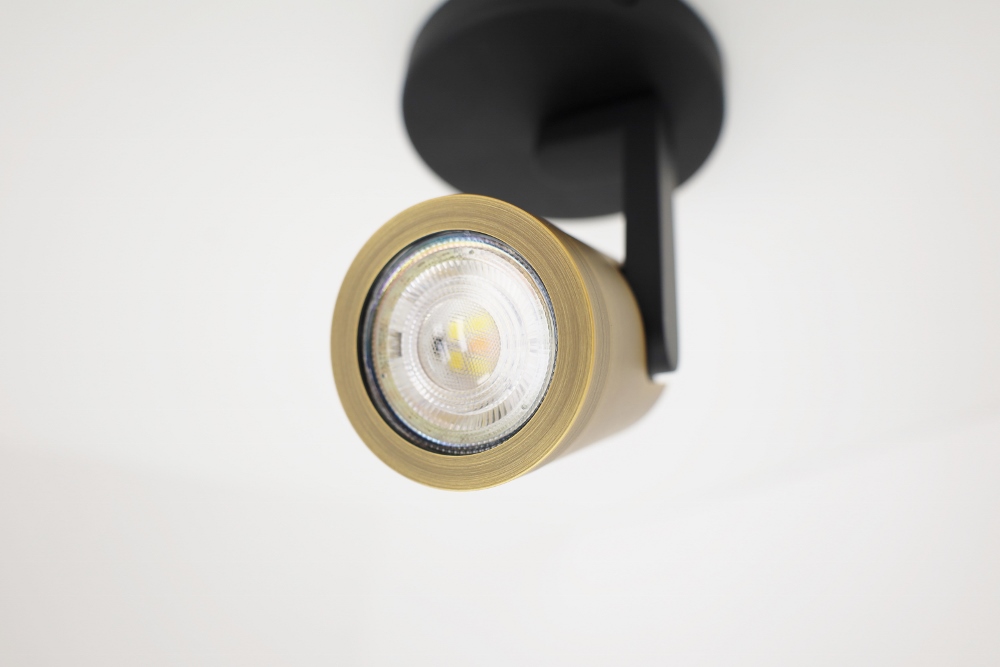 Stijlvolle strakke 1-lichts opbouwspot SCOOP rond | Zwart / Brons
