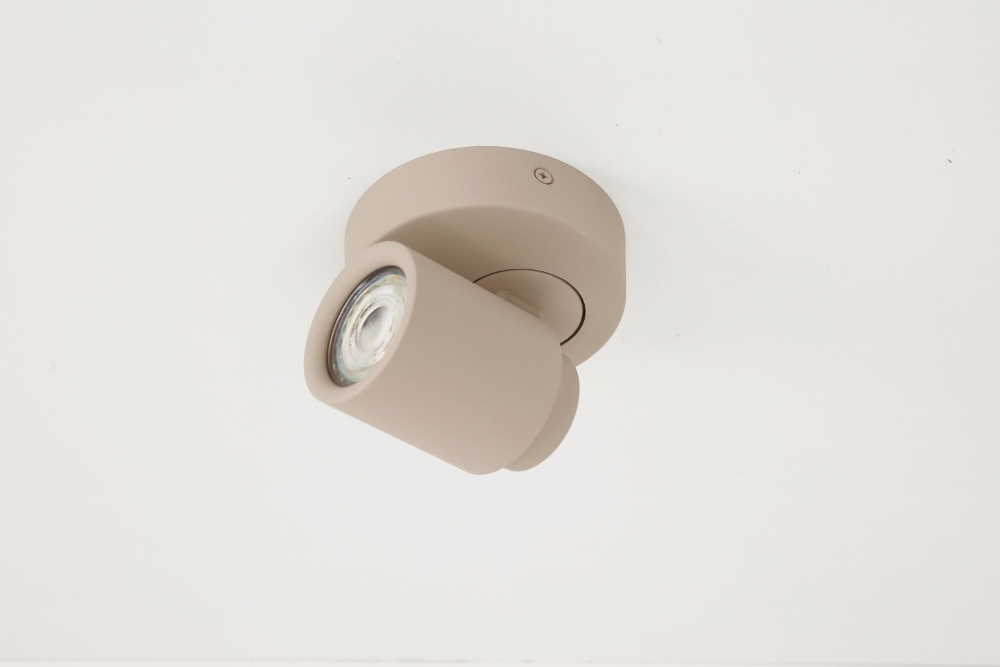 Stijlvolle opbouwspot ATTIRA 1-lichts rond GU10 | Creme / Zand