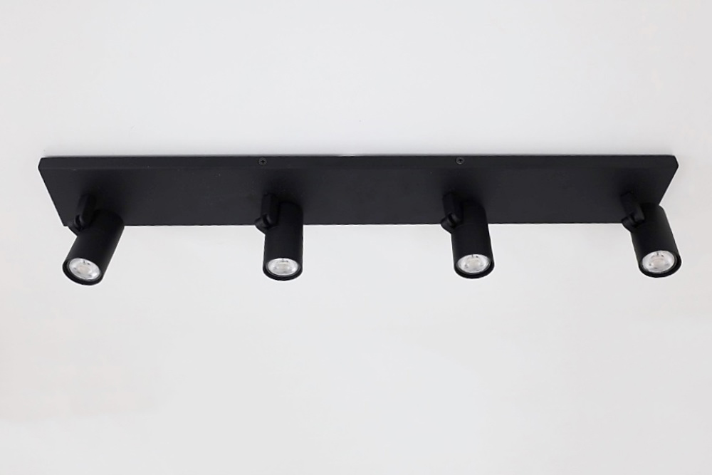 Minimalistische opbouwspot PETITE 4-lichts balk GU10 | Zwart